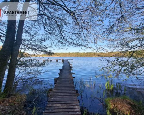 Działka nad jeziorem, z własnym strumykiem