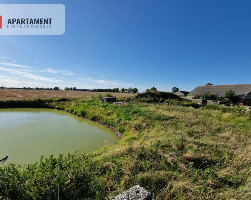 Atrakcyjna działka siedliskowa ze stawem
