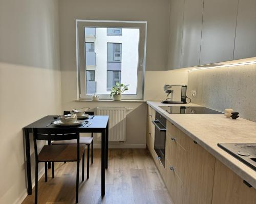 Kawalerka z balkonem I siłownia - Legnicka