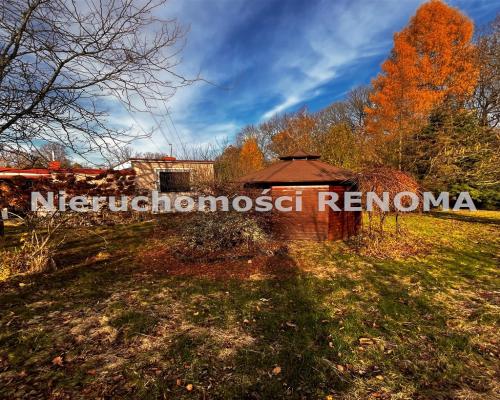 Działka budowlana 2414 m² z domkiem letniskowym –