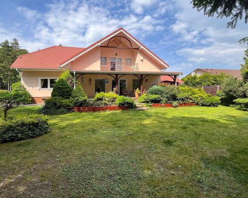 Dom z ogrodem Porosły