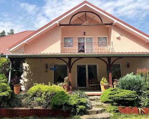 Dom z ogrodem Porosły