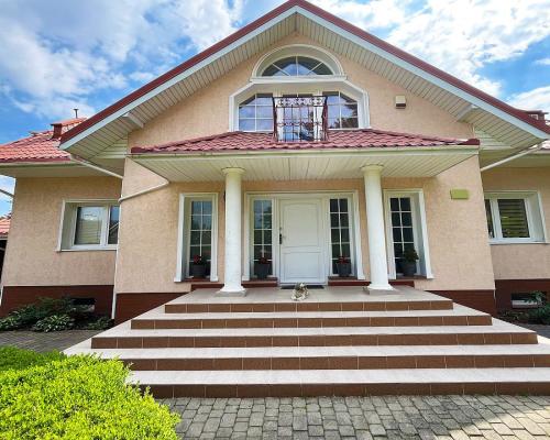 Dom z ogrodem Porosły