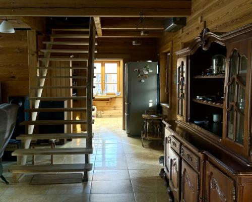 Drewniany dom z działką, sauną i garażem