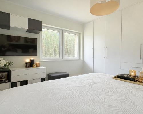 Dom w otulinie lasu blisko miasta