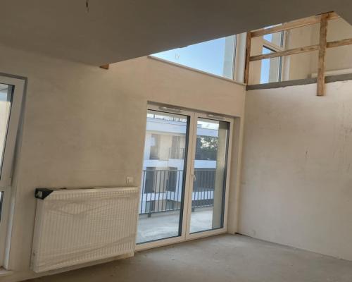 Apartament z antresolą i tarasem na dachu .