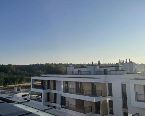 Apartament z antresolą i tarasem na dachu .