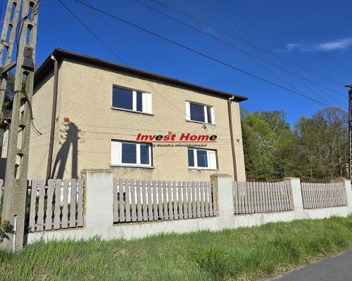 Dom do remontu z lasem.