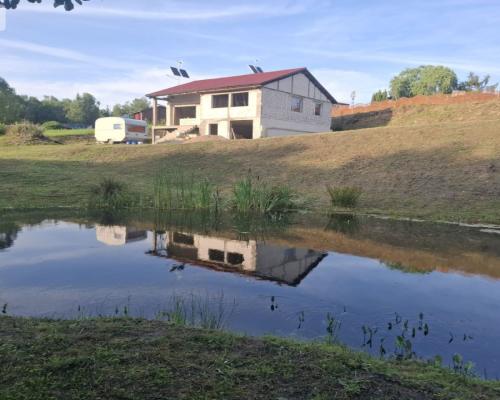 Dom w budowie nad rzeką dz. 2924 m²  Natura 2000