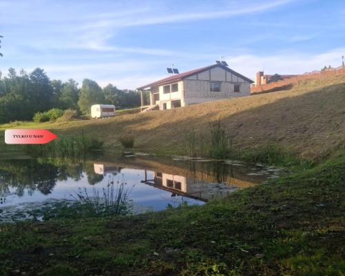 Dom w budowie nad rzeką dz. 2924 m²  Natura 2000