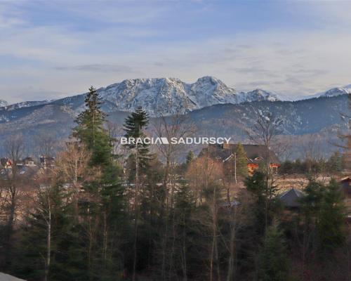 Dwupoziomowy Apartament z Widokiem na Giewont w Kościelisku    Oferujemy  na sprzedaż lub na wynajem długoterminowy  przestro