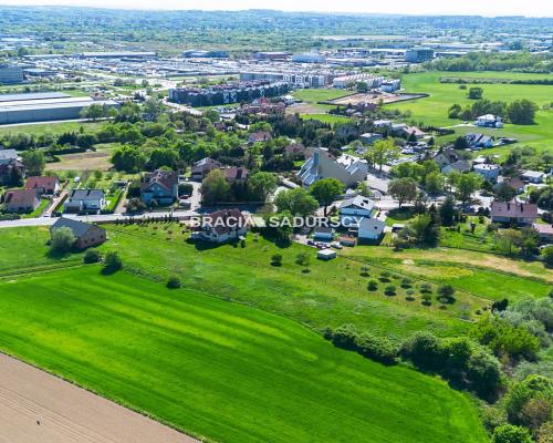 Działka z budynkiem usługowym (240m2) / 12 ar