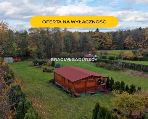 Enklawa Spokoju pod Lasem - Działka 20a z Potencjałem Budowlanym (Bęczyn)  Szukasz miejsca, gdzie jedynym dźwiękiem o poranku