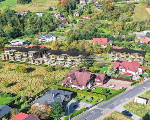 Inwestycja zlokalizowana jest w Szczyrku. Miasto to łączy w pełni rozwiniętą infrastrukturę z położeniem w wyjątkowo malownicze