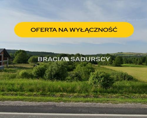 Działka budowlana w Ptaszkowej gm. Grybów      Oferujemy na sprzedaż działkę budowlaną (mieszkaniowo-usługową) o  powi
