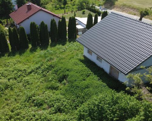 Dom wolnostojący w stanie surowym otwartym