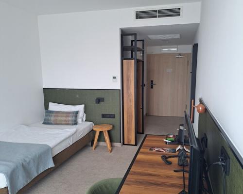 Pokój o pow. 16,26 m2 w hotelu ARCHE w Lublinie.
