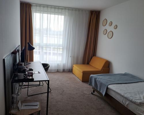 Pokój o pow. 16,26 m2 w hotelu ARCHE w Lublinie.