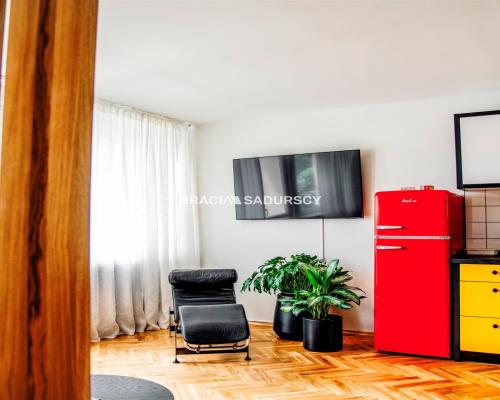 3 pokoje z balkonem na Traugutta