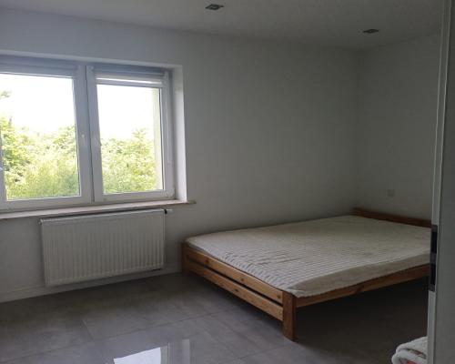 Mieszkanie 52 m² z działką 375 m² i garażem
