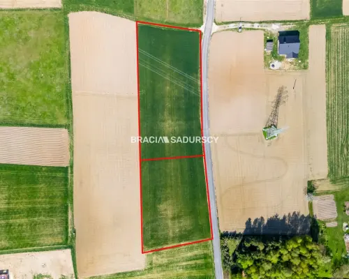 Działka budowlana / 34 + 24 ar