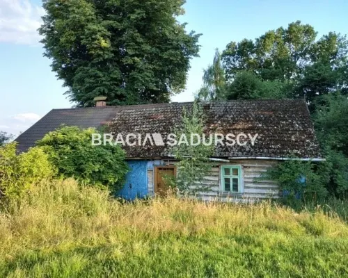 Działka rolna z drewnianym domem Nowa Wieś