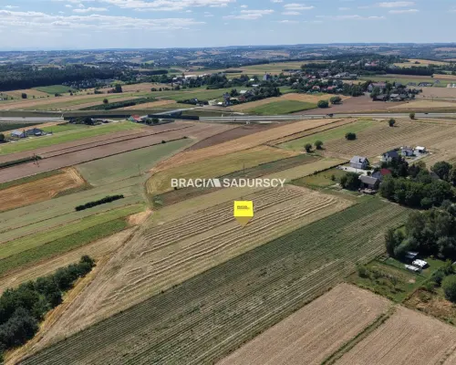Duża działka inwestycyjna pod Krakowem - 1,5 km od S7 (węzeł Widoma) | Potencjał przekształcenia | Opcja zakupu 8 414 m² g