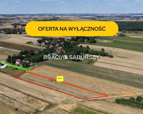 Duża działka z ogromnym potencjałem wzrostu wartości - tylko 1,5 km od węzła S7 i 15 min od Krakowa!    Szukasz bezpiecznej l