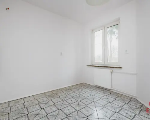 Wysoki parter z balkonem