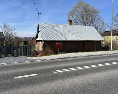 Drewniany dom na działce w Świeciechowie Dużym.