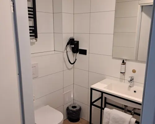 Pokój o pow. 16,26 m2 w hotelu ARCHE w Lublinie.