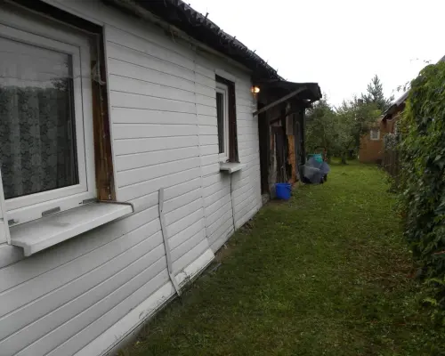 Dom z drewna przy Wiśle ul. Modrzycka w Dęblinie.